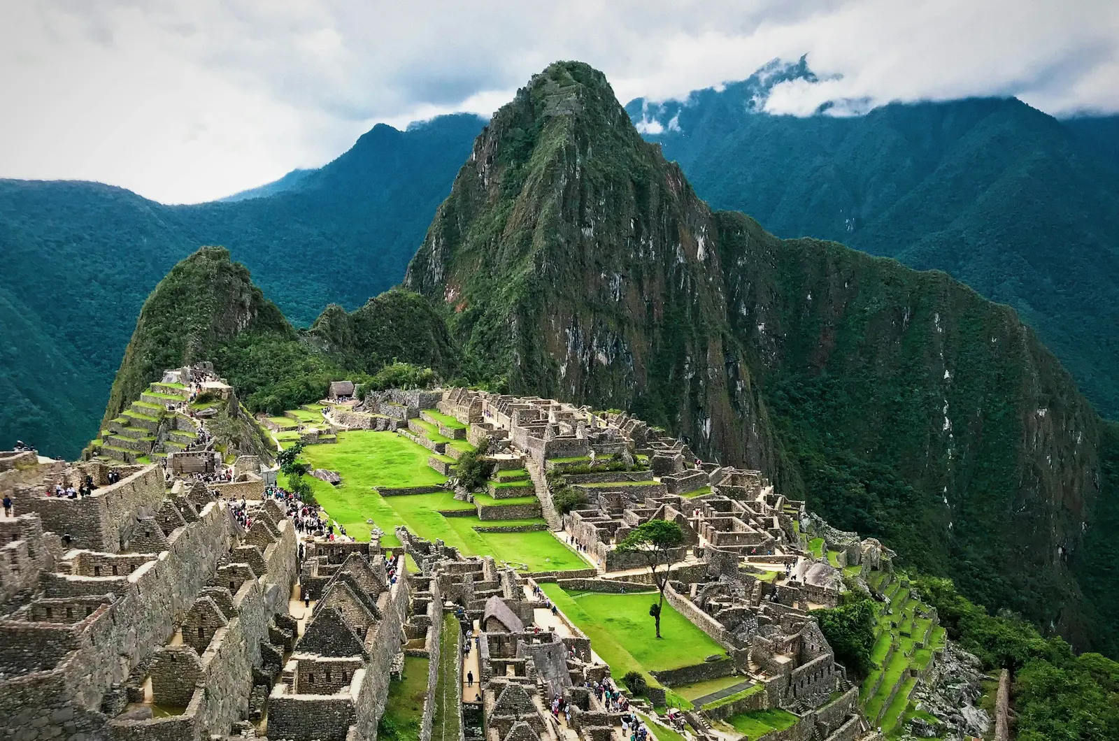 Machu Picchu's stone terraces under the peak of Huayna Picchu